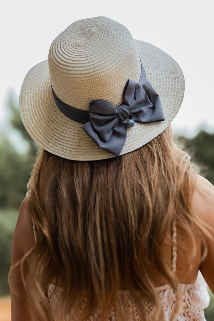 Słomkowy kapelusz z kokardą Aris 